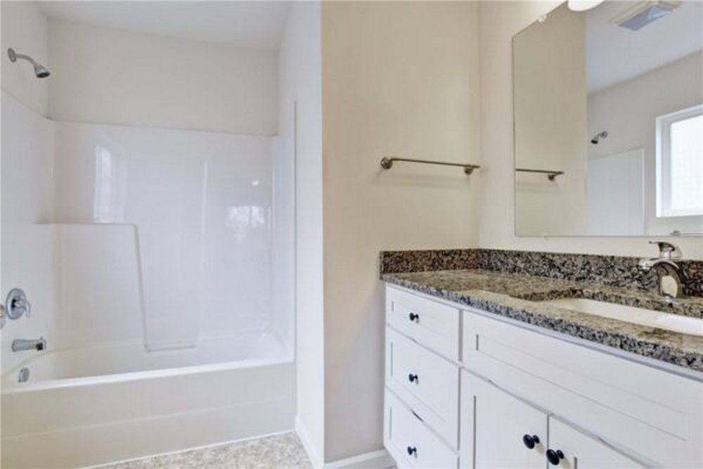 Spring Bathroom Remodels with Durable Polymer Bath Systems